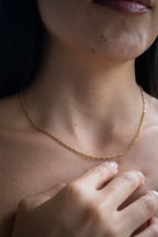 Cadena Singapur Mujer